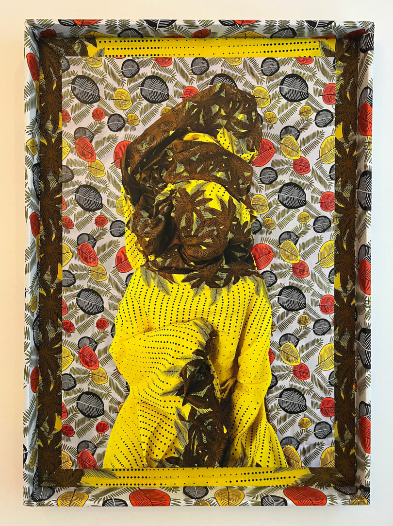 Elizabeth Graziolo narrates a scene where a person in a patterned yellow and brown outfit blends seamlessly into a background of leaves and polka dots, with the frame echoing the same motif.