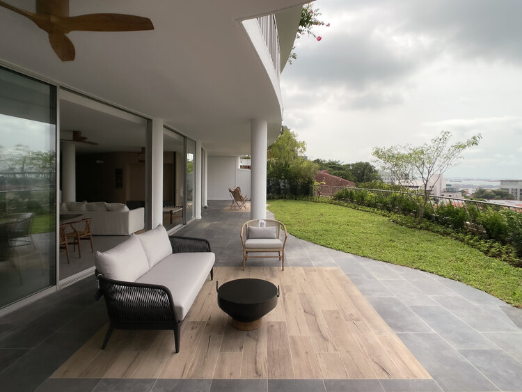 dP Apartment House / Tristan & Ju - Interior Photography, Living Room, Chair, Patio, Balcony, Deck, Courtyard